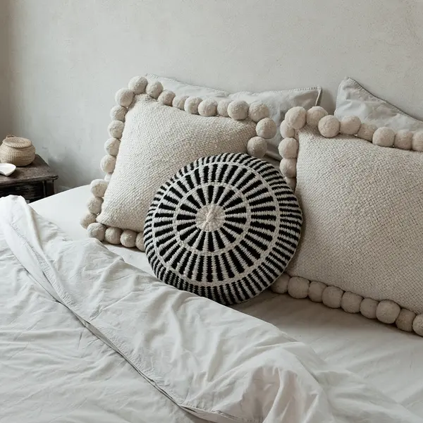 Coussin rond à motifs blanc
