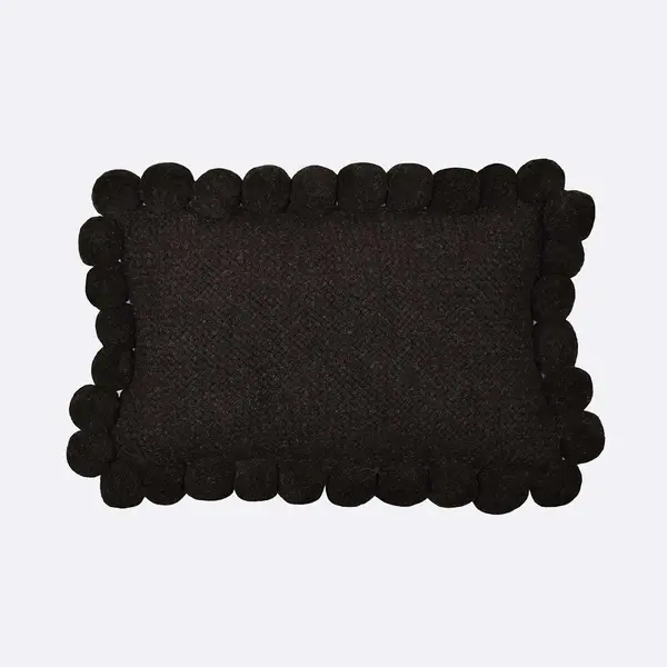Coussin à pompons noir 30×60